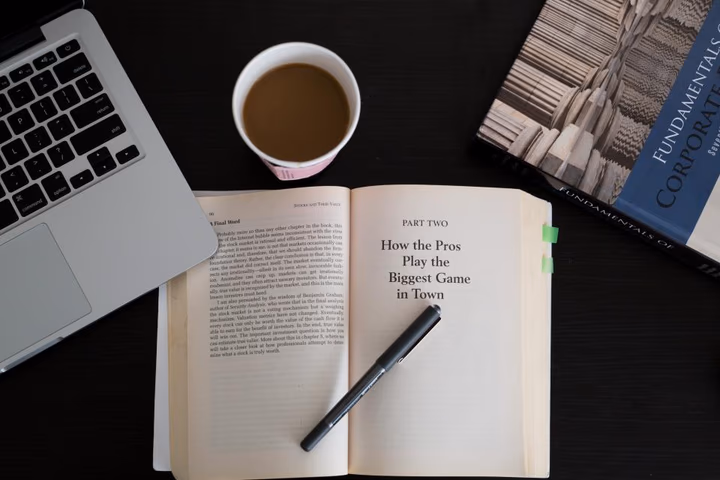 A person reading an open book