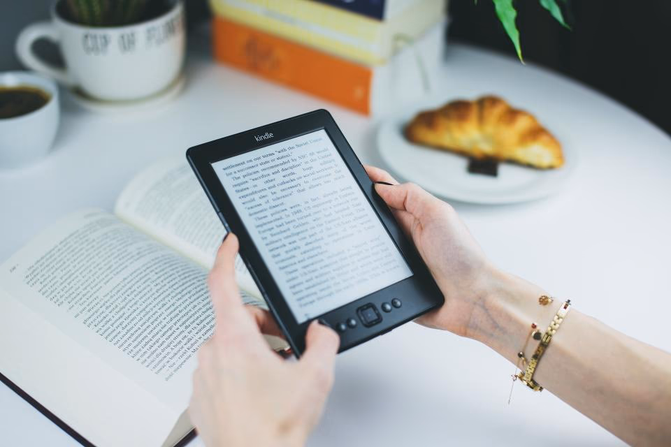 An e-reader with a book open on screen
