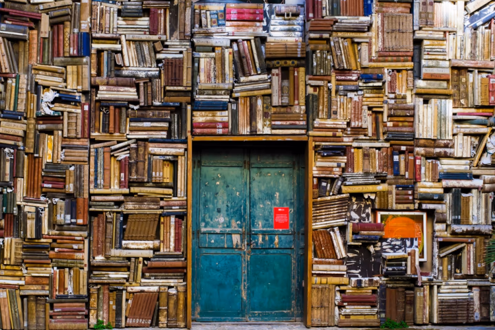 Colourful books arranged on shelves