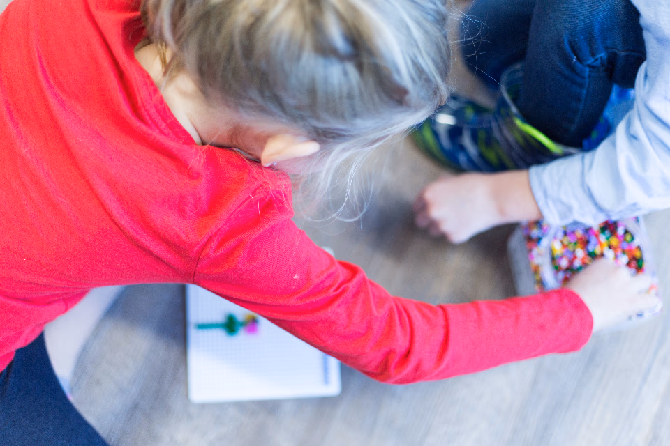 Children playing together indoors