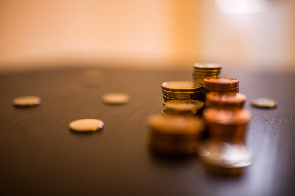 Coins stacked on a surface